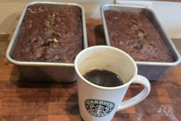 baked Cannabis-infused Cherry Dark Chocolate Chip cannabanana bread baked and ready to slice.